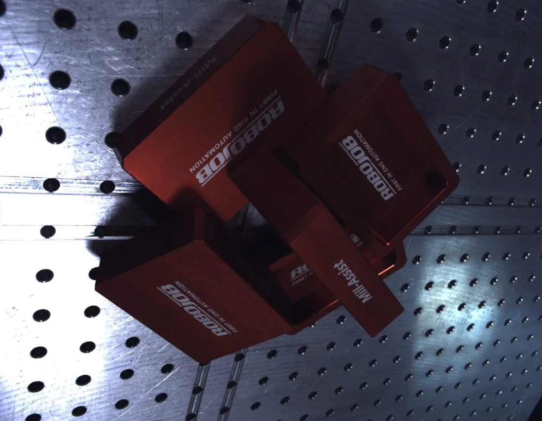 Real image: red trays on the pegboard