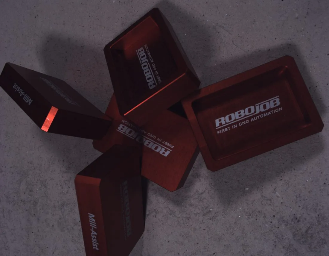 Real image: red trays on the speckled board
